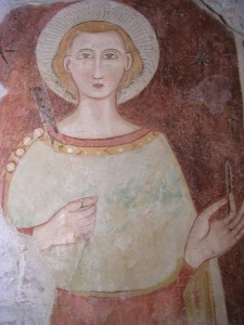 affresco votivo in cui il martine Claudio regge uno scalpello ed un martello