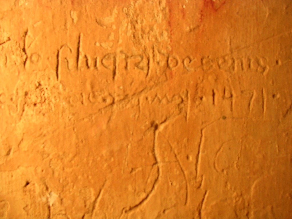 uno dei tanti graffiti lasciati sull'intonaco di San Claudio a Spello